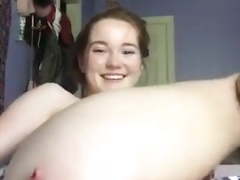 Blonde inserting three fingers in the ass